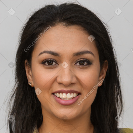 Joyful latino young-adult female with long  brown hair and brown eyes