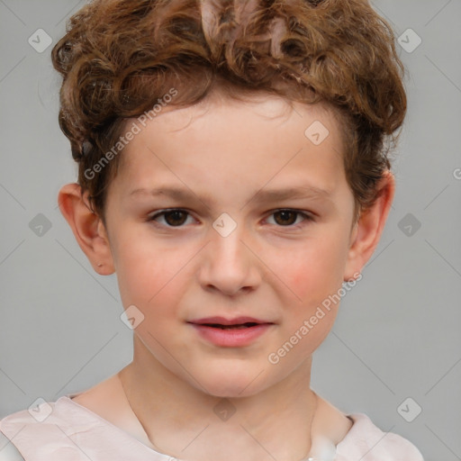 Joyful white child male with short  brown hair and brown eyes