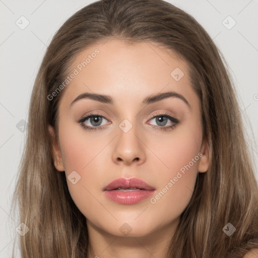 Neutral white young-adult female with long  brown hair and brown eyes