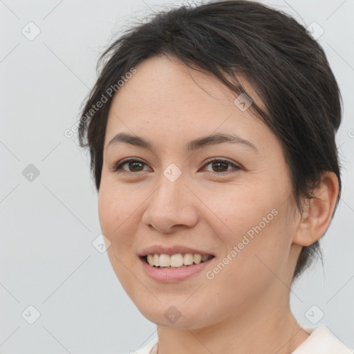 Joyful white young-adult female with medium  brown hair and brown eyes