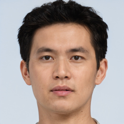 Neutral asian young-adult male with short  brown hair and brown eyes