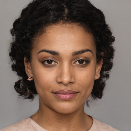 Joyful latino young-adult female with medium  black hair and brown eyes