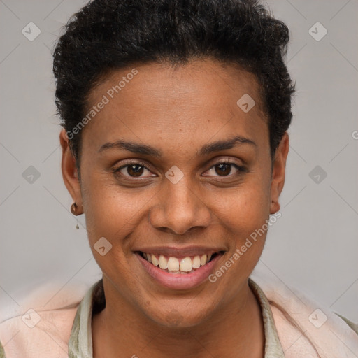 Joyful black young-adult female with short  brown hair and brown eyes