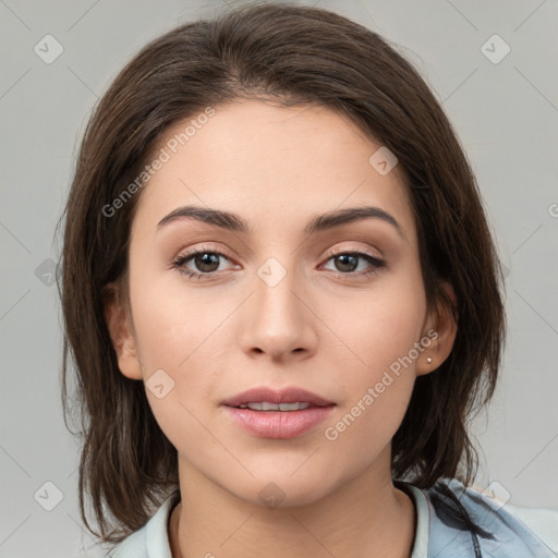 Neutral white young-adult female with medium  brown hair and brown eyes