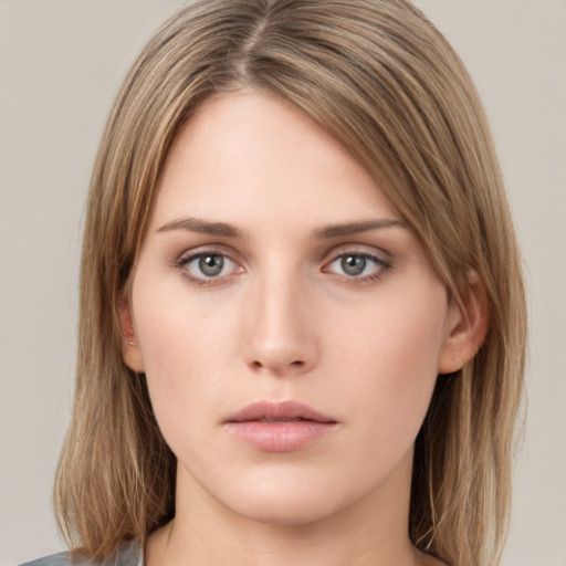 Neutral white young-adult female with medium  brown hair and grey eyes