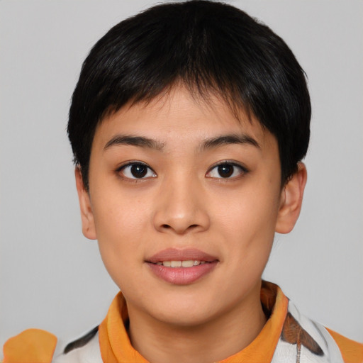Joyful asian young-adult female with short  black hair and brown eyes