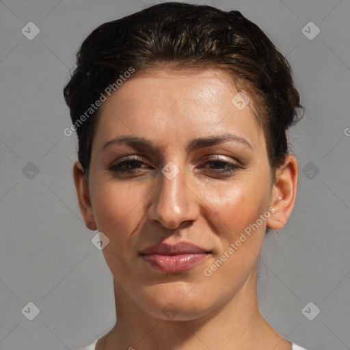 Joyful white adult female with short  brown hair and brown eyes