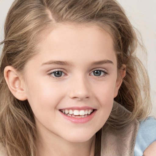 Joyful white child female with long  brown hair and brown eyes