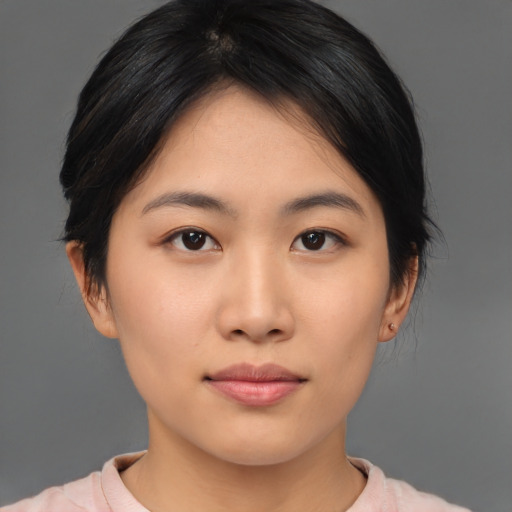 Neutral asian young-adult female with medium  black hair and brown eyes