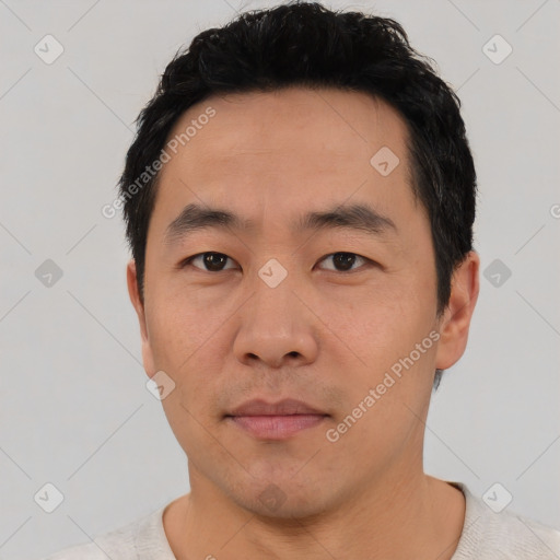 Neutral asian young-adult male with short  black hair and brown eyes