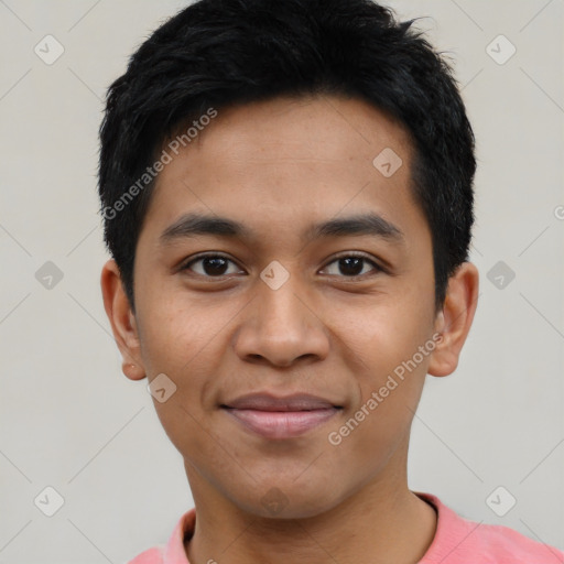 Joyful latino young-adult male with short  black hair and brown eyes