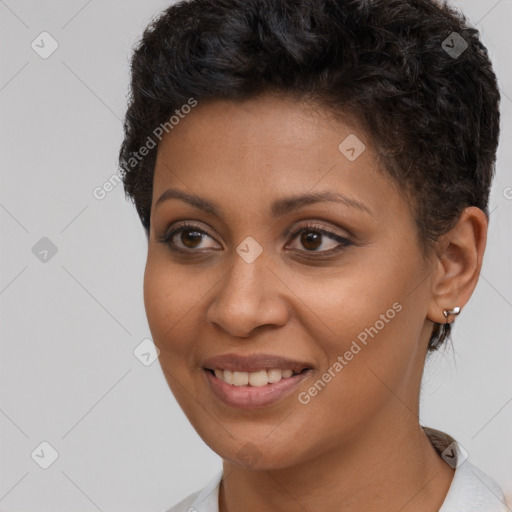 Joyful latino young-adult female with short  brown hair and brown eyes