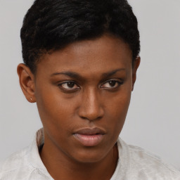 Neutral black young-adult female with short  brown hair and brown eyes