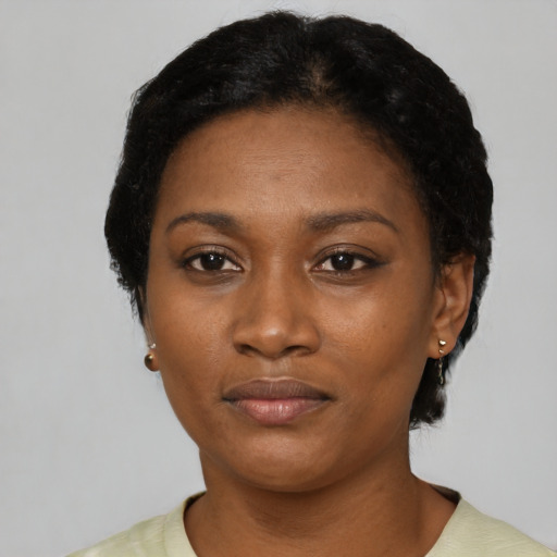 Neutral black adult female with short  black hair and brown eyes