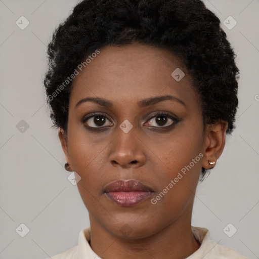 Neutral black young-adult female with short  brown hair and brown eyes