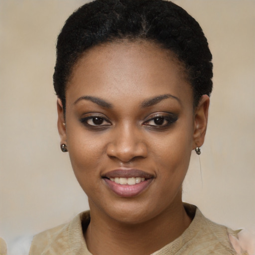 Joyful black young-adult female with short  black hair and brown eyes