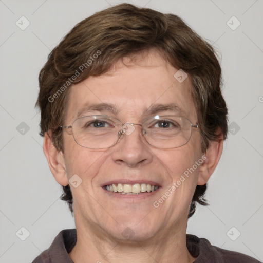 Joyful white adult male with short  brown hair and blue eyes