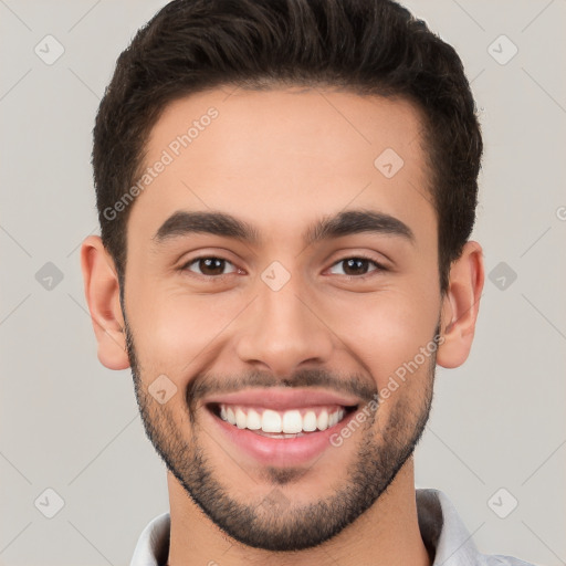 Joyful white young-adult male with short  brown hair and brown eyes