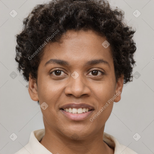 Joyful black young-adult female with short  brown hair and brown eyes