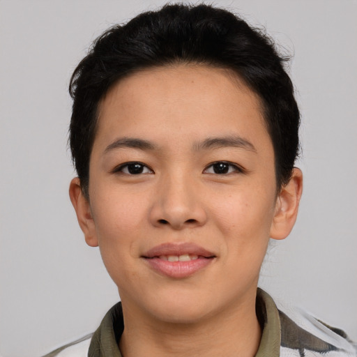 Joyful asian young-adult female with short  black hair and brown eyes