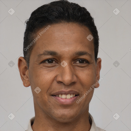 Joyful latino adult male with short  black hair and brown eyes