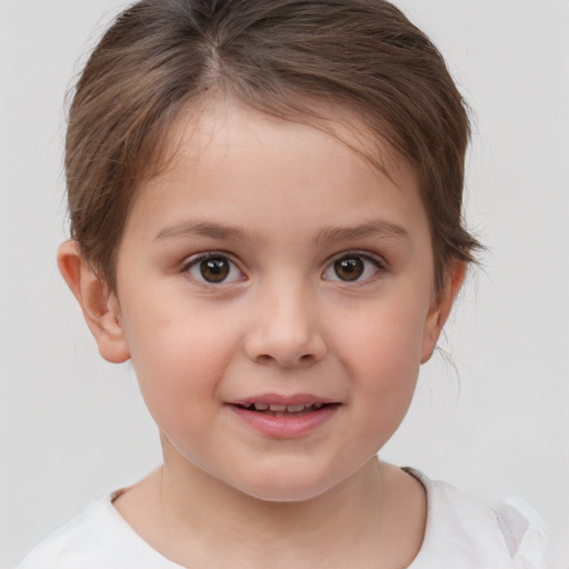 Joyful white child female with medium  brown hair and brown eyes