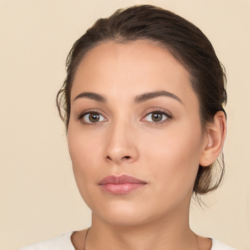 Neutral white young-adult female with medium  brown hair and brown eyes