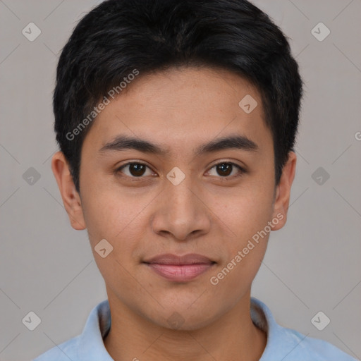 Joyful asian young-adult male with short  brown hair and brown eyes