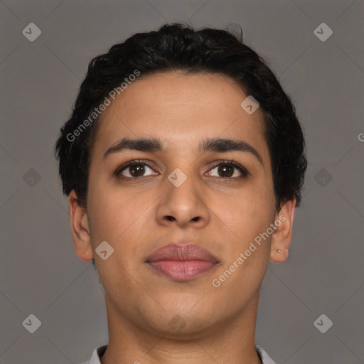 Joyful latino young-adult male with short  brown hair and brown eyes