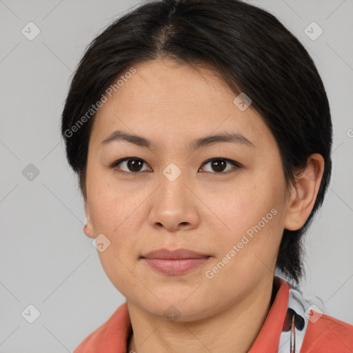 Joyful asian young-adult female with medium  brown hair and brown eyes