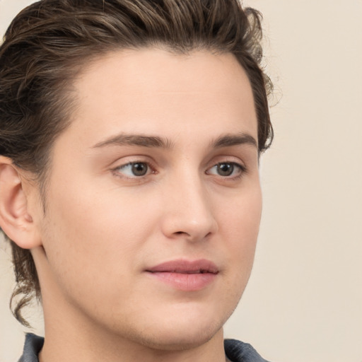 Joyful white young-adult male with medium  brown hair and brown eyes