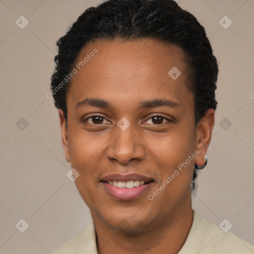 Joyful black young-adult male with short  black hair and brown eyes