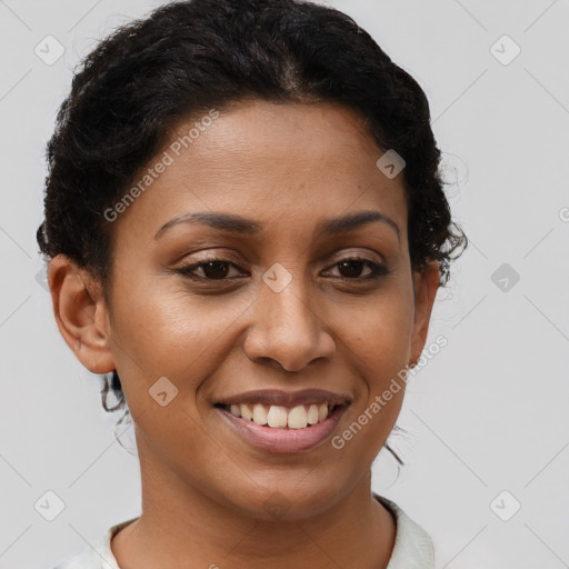 Joyful latino young-adult female with short  brown hair and brown eyes