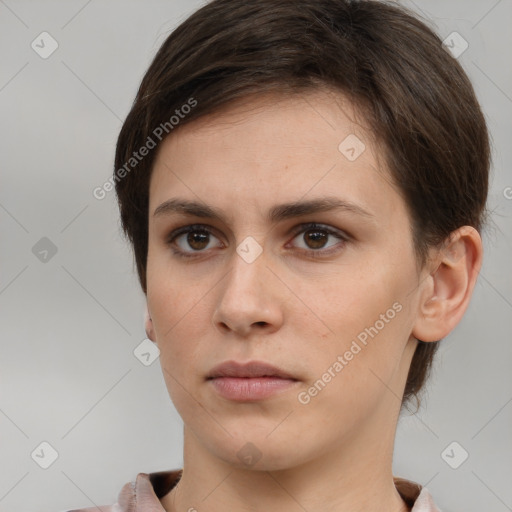 Neutral white young-adult female with short  brown hair and brown eyes