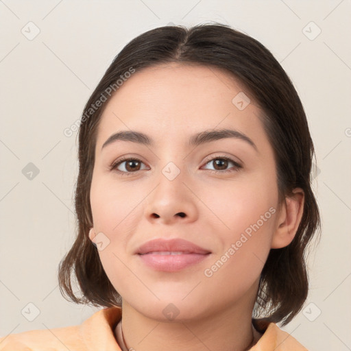 Neutral white young-adult female with medium  brown hair and brown eyes