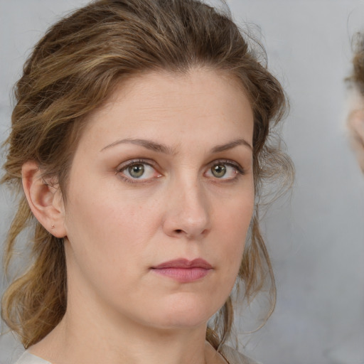 Neutral white young-adult female with medium  brown hair and brown eyes