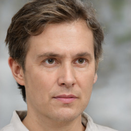 Neutral white adult male with short  brown hair and brown eyes