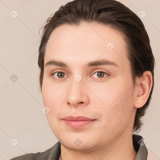 Joyful white young-adult male with medium  brown hair and brown eyes