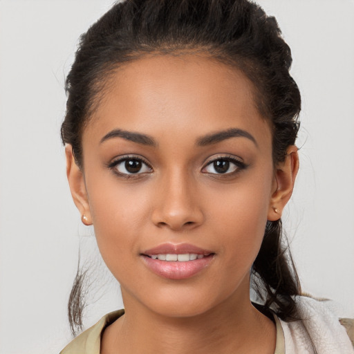 Joyful white young-adult female with long  brown hair and brown eyes