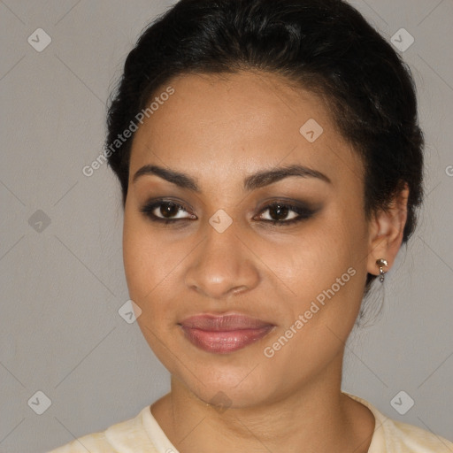 Joyful latino young-adult female with medium  brown hair and brown eyes