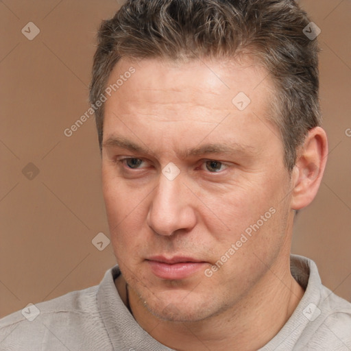 Neutral white adult male with short  brown hair and brown eyes