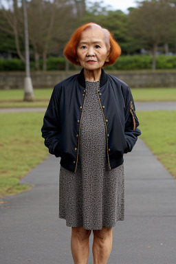 Filipino elderly female with  ginger hair