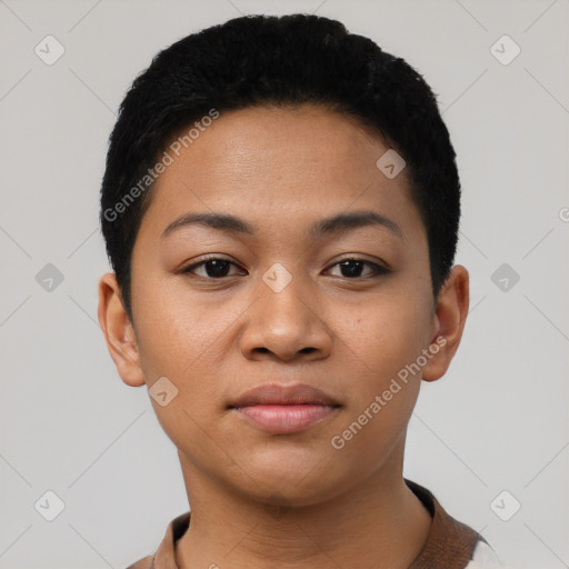 Joyful latino young-adult female with short  black hair and brown eyes