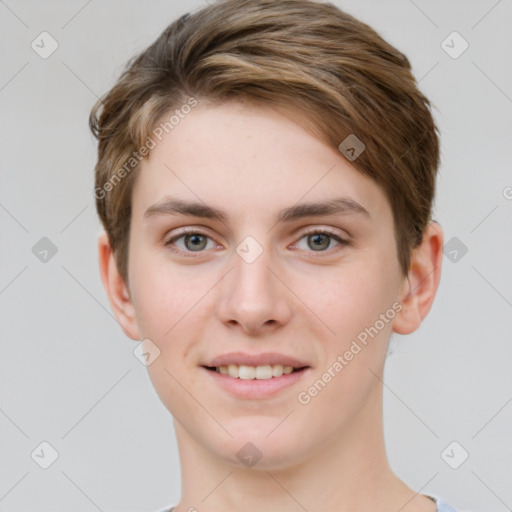 Joyful white young-adult female with short  brown hair and grey eyes