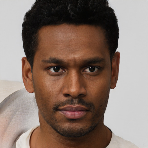 Neutral black young-adult male with short  brown hair and brown eyes