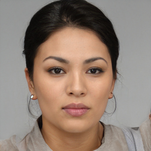 Neutral asian young-adult female with medium  brown hair and brown eyes