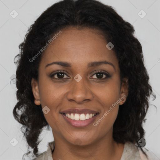 Joyful black young-adult female with medium  brown hair and brown eyes