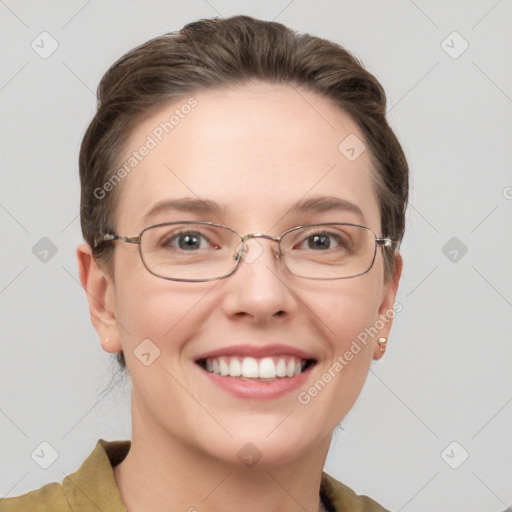 Joyful white young-adult female with short  brown hair and grey eyes