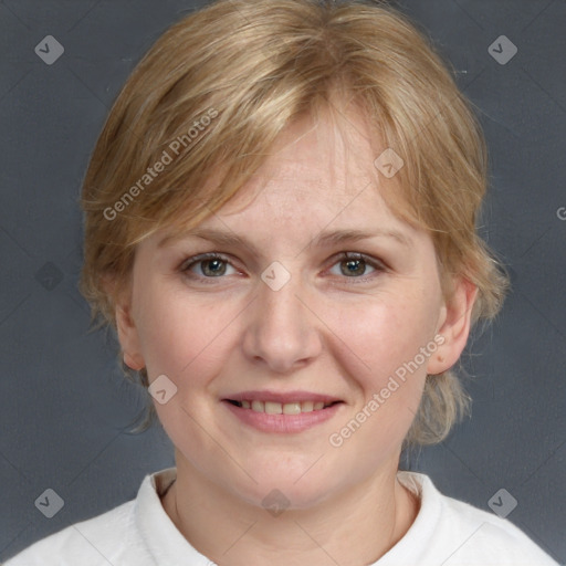 Joyful white adult female with medium  brown hair and grey eyes