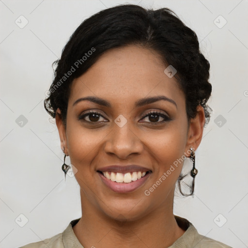 Joyful latino young-adult female with short  black hair and brown eyes